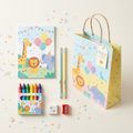 Illustrative kids’ birthday stationery gift set with colouring book, crayons, pencils, eraser, sharpener and gift bag