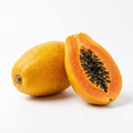 Fresh premium papaya whole and halved showing orange flesh on white background