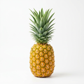 Whole pineapple with green crown on a white background