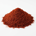 A mound of finely ground red chilli powder on a clean white background