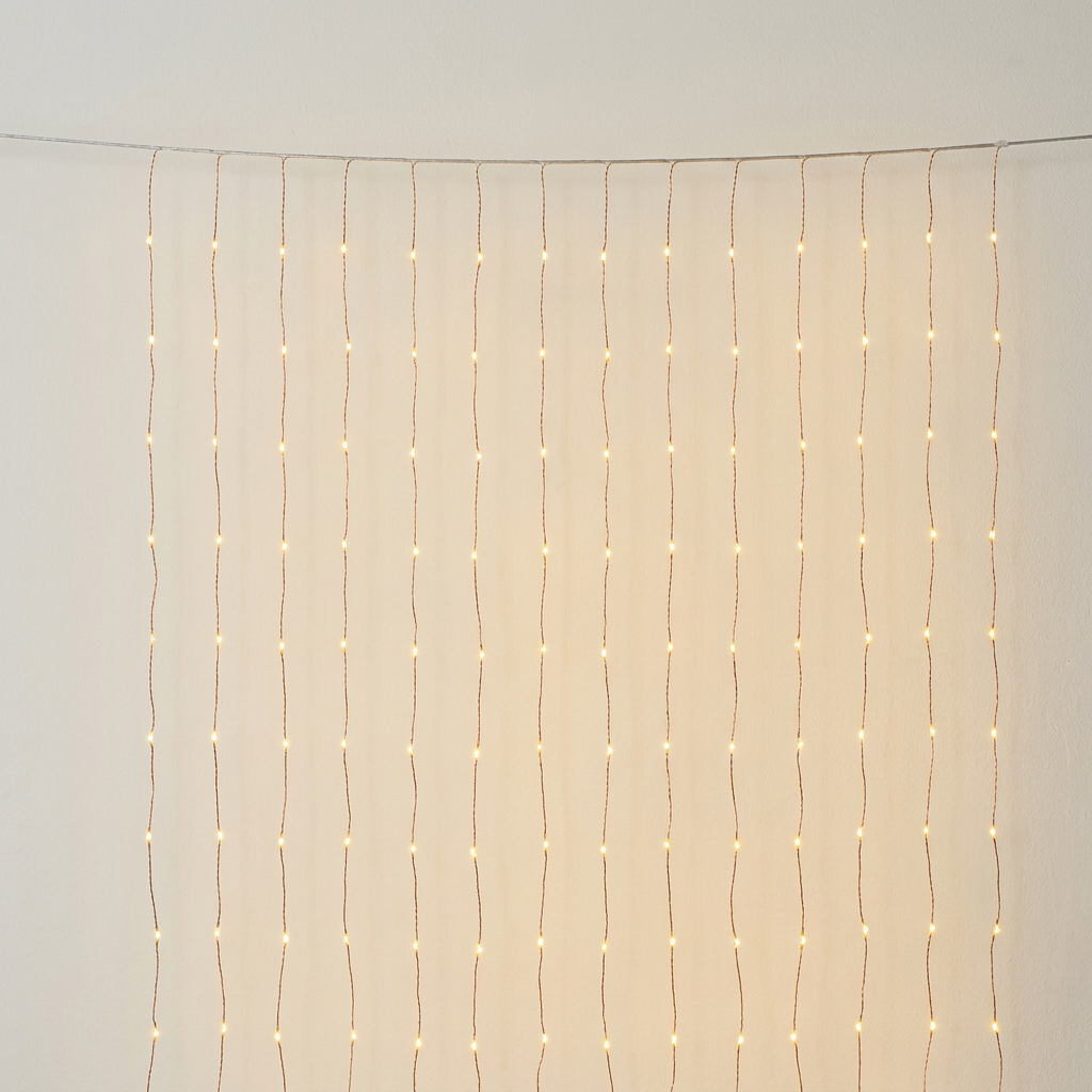 Illustrative plain LED curtain lights with hanging strands of warm golden LEDs