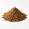 A mound of ground garam masala spice blend on a clean white background