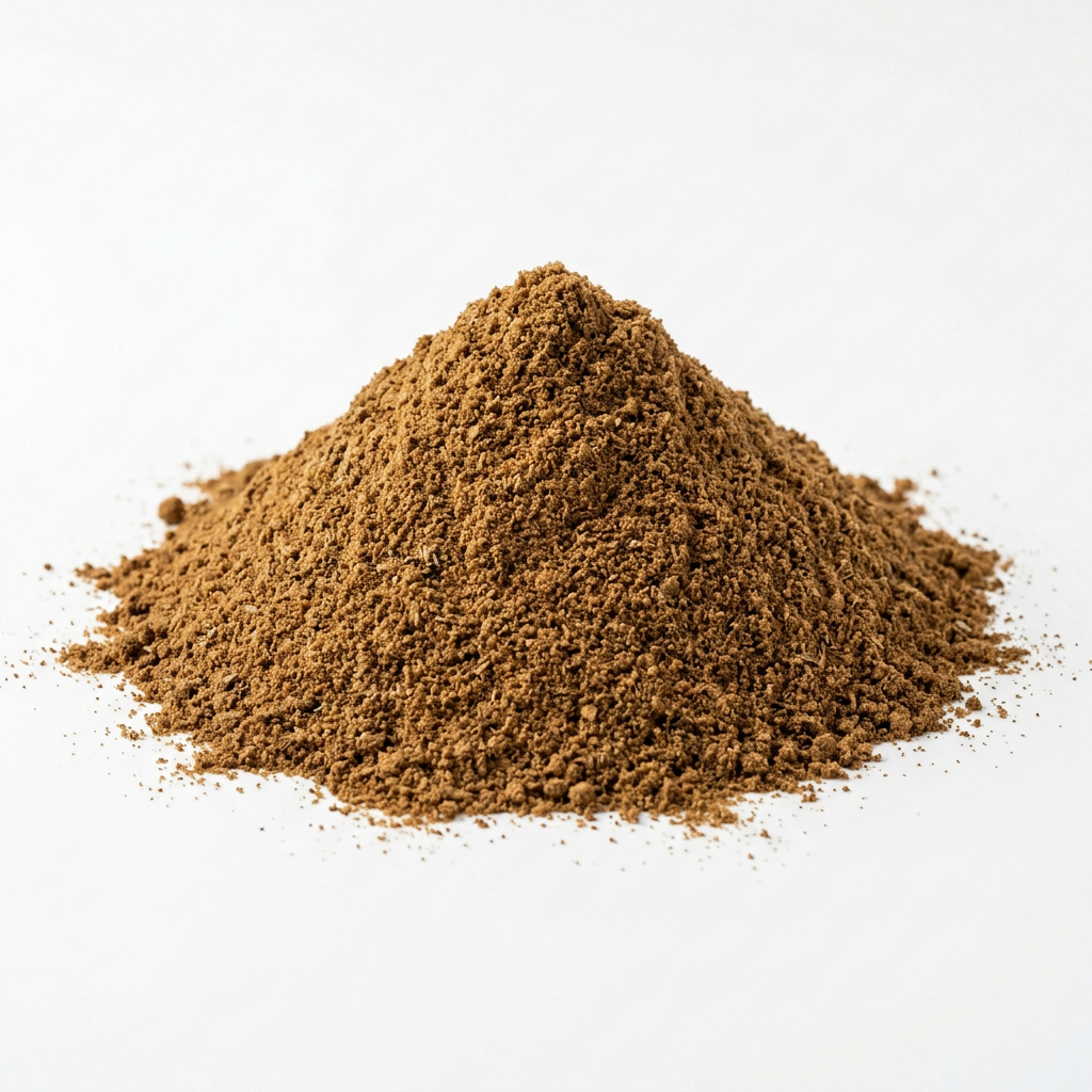 A mound of ground garam masala spice blend on a clean white background