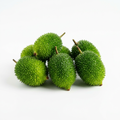 Fresh spiny gourd kantola neat cluster on white background