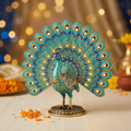 Illustrative blue and turquoise peacock-shaped decorative LED tabletop light with gold accents