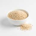 Ivory split skinless urad daal in a white bowl on a white background