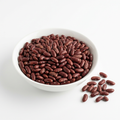 Red rajma kidney beans in a white porcelain bowl on a white background